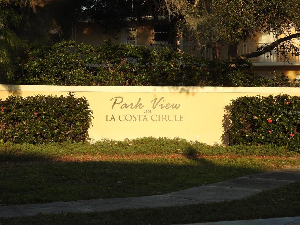 A beige sign with the text Park View on La Costa Circle stands outdoors — 972 LA COSTA CIRCLE UNIT 8, SARASOTA, FL