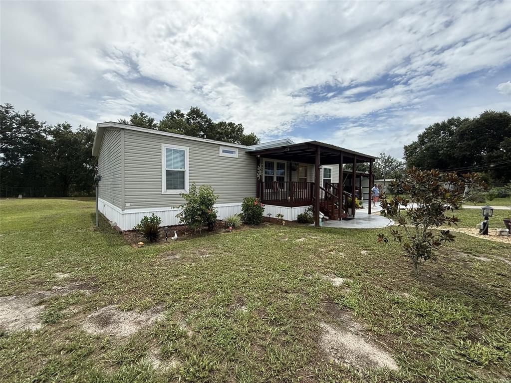 9049 BURR DRIVE, POLK CITY, FL — photo 2 of 11