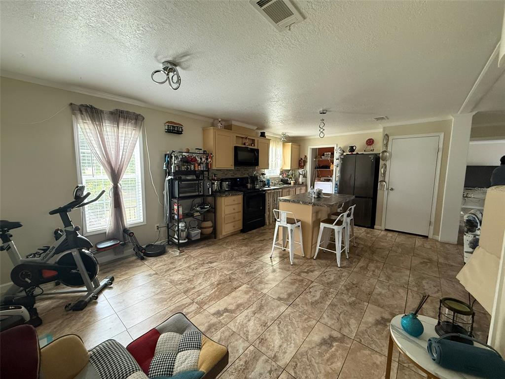 9049 BURR DRIVE, POLK CITY, FL — photo 4 of 11