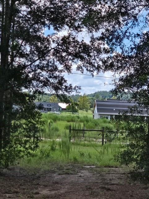 18505 HOLLOWAY LANE, DADE CITY, FL — photo 5 of 16