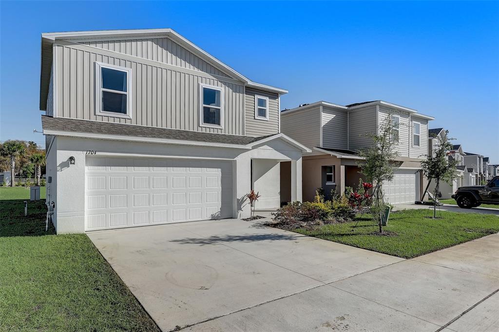 This is a floor plan of an upper level featuring three bedrooms, a loft, and laundry — 2060 GOLDEN BEAK DRIVE, EAGLE LAKE, FL