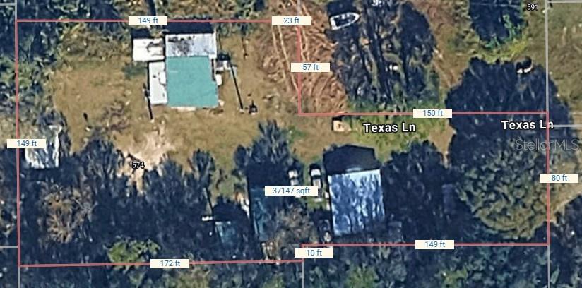 An aerial map shows a residential property lot with two buildings and labeled boundary dimensions — 574 THISTLE HILL DRIVE, OSTEEN, FL