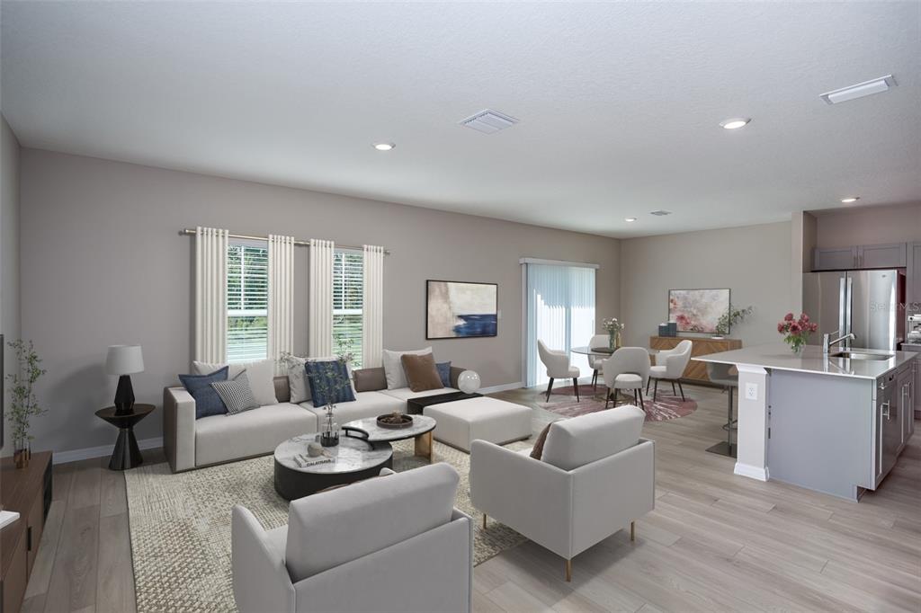 This is a digital rendering of an open-concept living room, dining area, and kitchen — 5445 SAN PIETRO DRIVE, WINTER HAVEN, FL