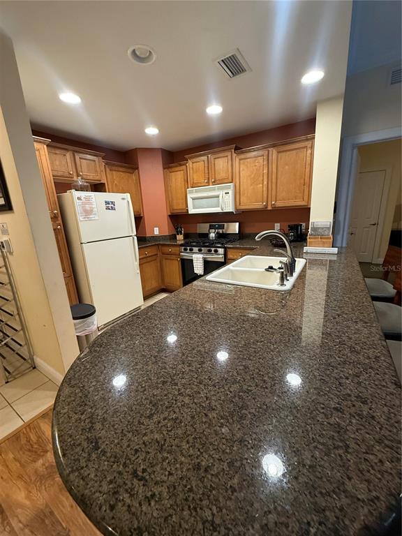 7703 HERITAGE CROSSING WAY UNIT 101, REUNION, FL — photo 5 of 14