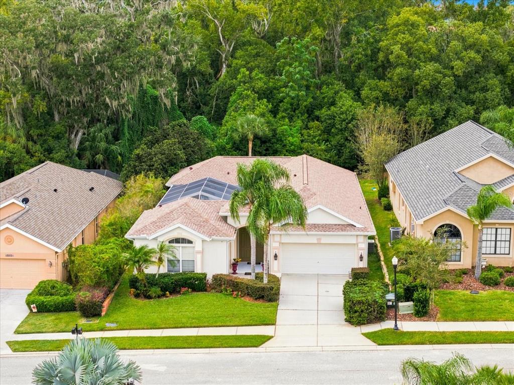 12220 WOODLANDS CIRCLE, DADE CITY, FL — photo 2 of 30