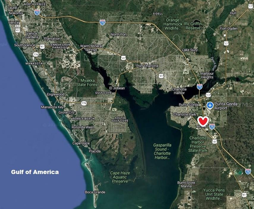 This is a satellite map showing the area around Charlotte Harbor in Florida — 5905 GREY LANE, PUNTA GORDA, FL