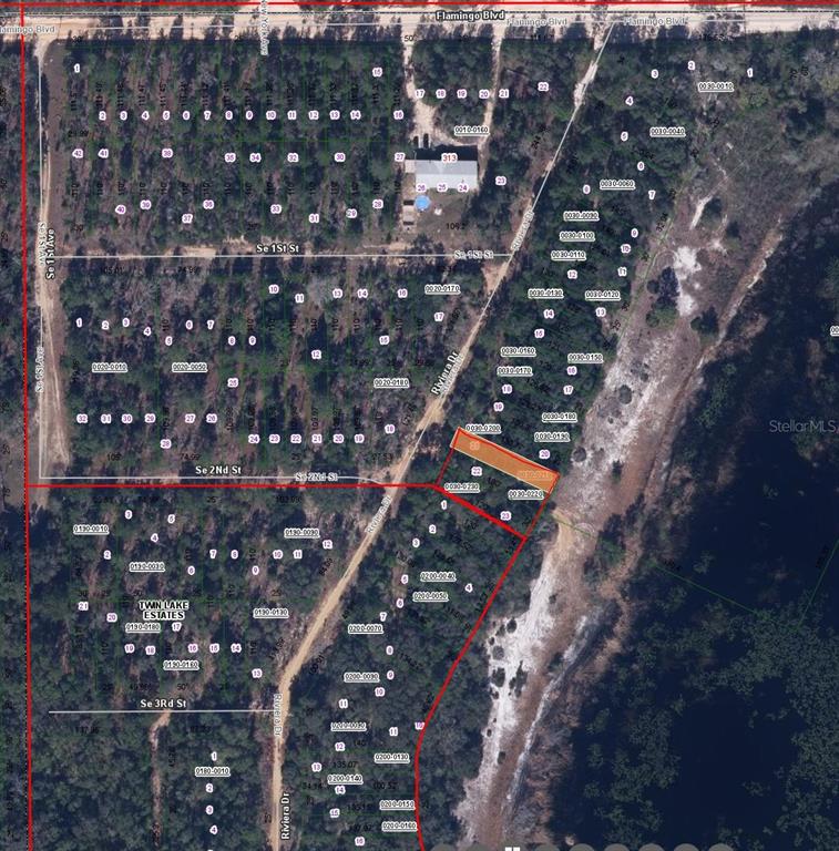 This is an aerial map showing a residential subdivision with highlighted property lots — 00 RIVIERA DRIVE, INTERLACHEN, FL