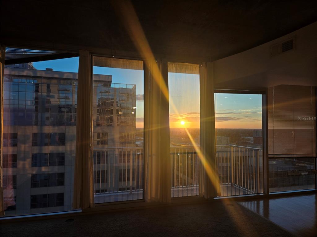 This floor plan shows a one-bedroom apartment with a living room, kitchen, balcony, and bathroom — 155 S COURT AVENUE UNIT 2008, ORLANDO, FL
