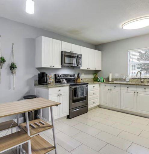 2704 CLUB CORTILE CIRCLE, KISSIMMEE, FL — photo 4 of 30