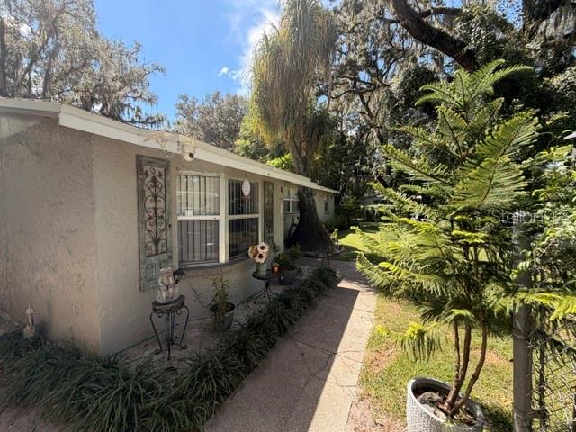 11615 GROVEWOOD AVENUE, THONOTOSASSA, FL — photo 3 of 29
