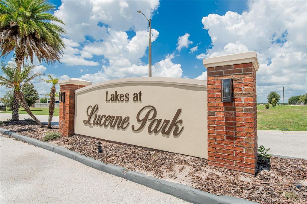 A brick and stucco monument sign for Lakes at Lucerne Park stands outdoors — 255 HAINES BOULEVARD, WINTER HAVEN, FL