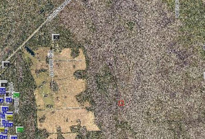 This is an aerial map showing a plot of land highlighted in red — NA, DELAND, FL