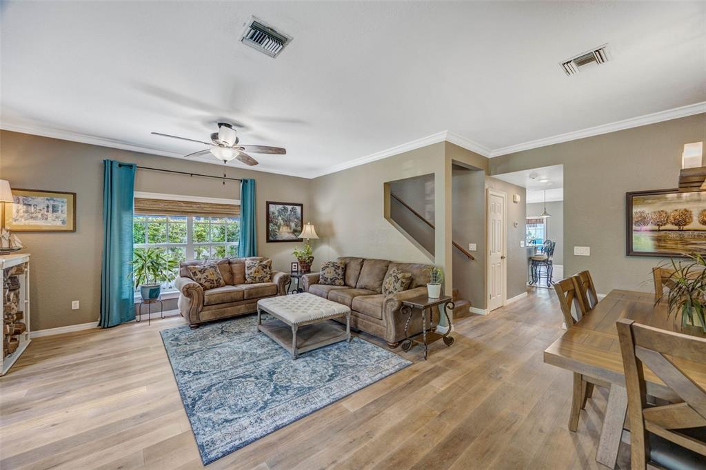 An aerial view shows a residential neighborhood with a red arrow pointing to a house — 852 35TH AVENUE N, ST PETERSBURG, FL