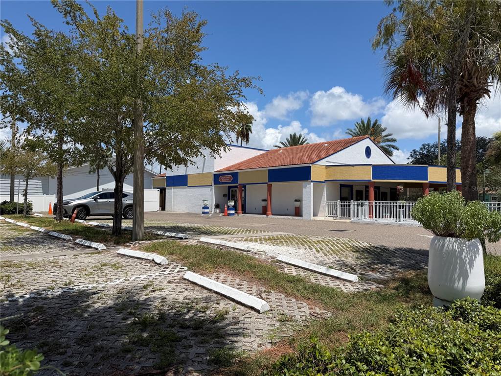 A single-story commercial building with a red tile roof and a paved parking lot — 1501 CLEARWATER LARGO ROAD N, LARGO, FL