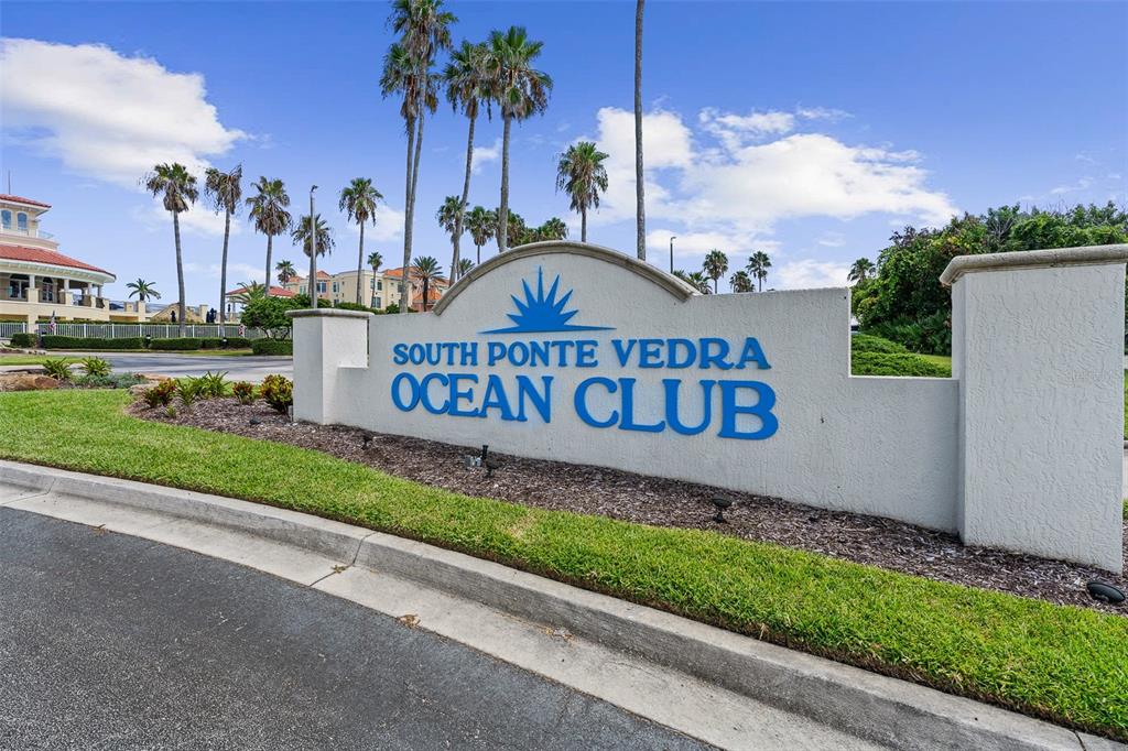 A sign for the South Ponte Vedra Ocean Club stands near a road with palm trees — 230 N SERENATA DRIVE UNIT 711, PONTE VEDRA BEACH, FL