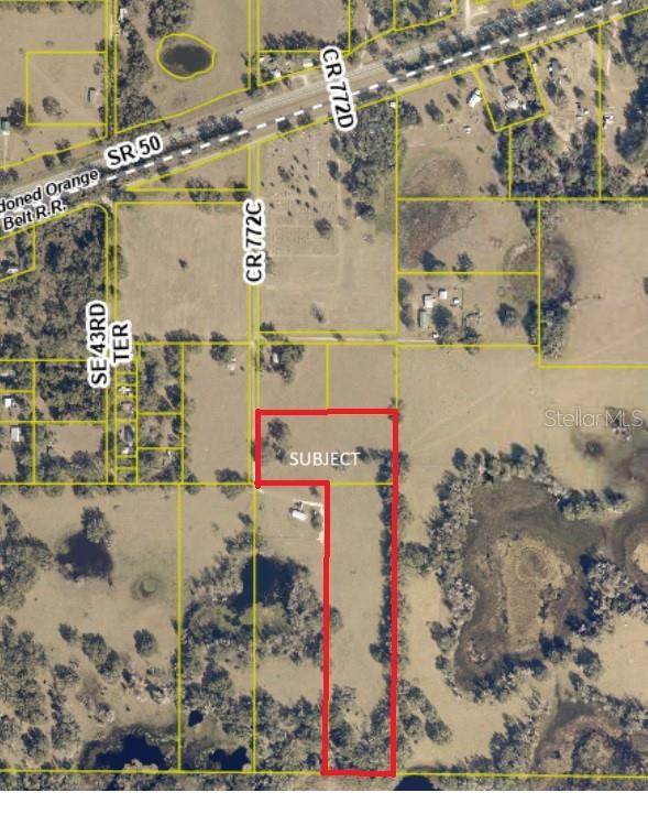An aerial map shows a parcel of land outlined in red near a road intersection — CR 772C, WEBSTER, FL