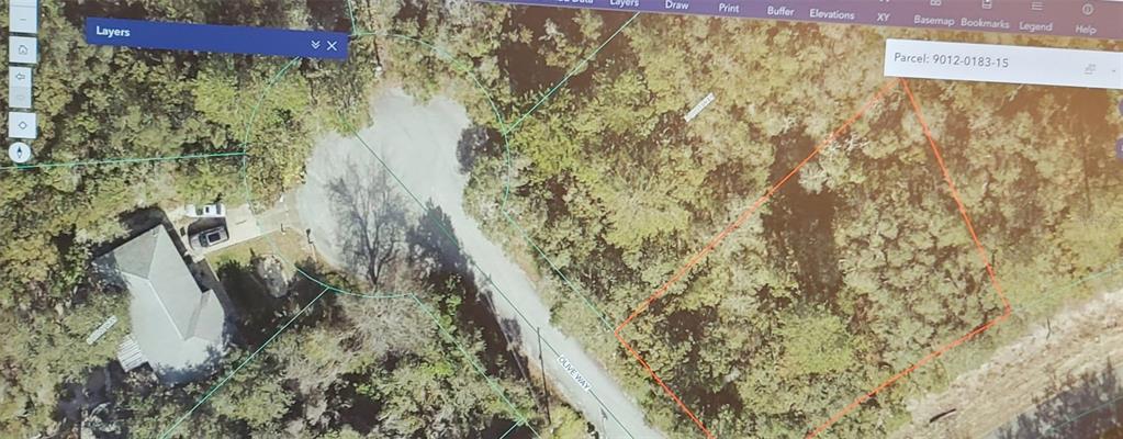This map shows a wooded residential parcel outlined in red next to a cul-de-sac — Lot 15 OLIVE WAY, OCALA, FL