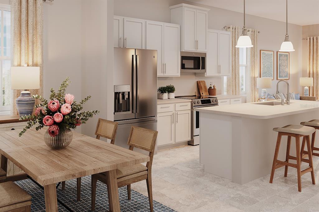 This is a rendering of a modern kitchen with white cabinets, stainless appliances, and an island — 3573 MOCKING BIRD DRIVE, AUBURNDALE, FL