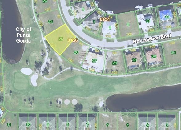 This is a satellite map view showing a vacant residential lot highlighted in yellow — 3739 BAL HARBOR BOULEVARD, PUNTA GORDA, FL