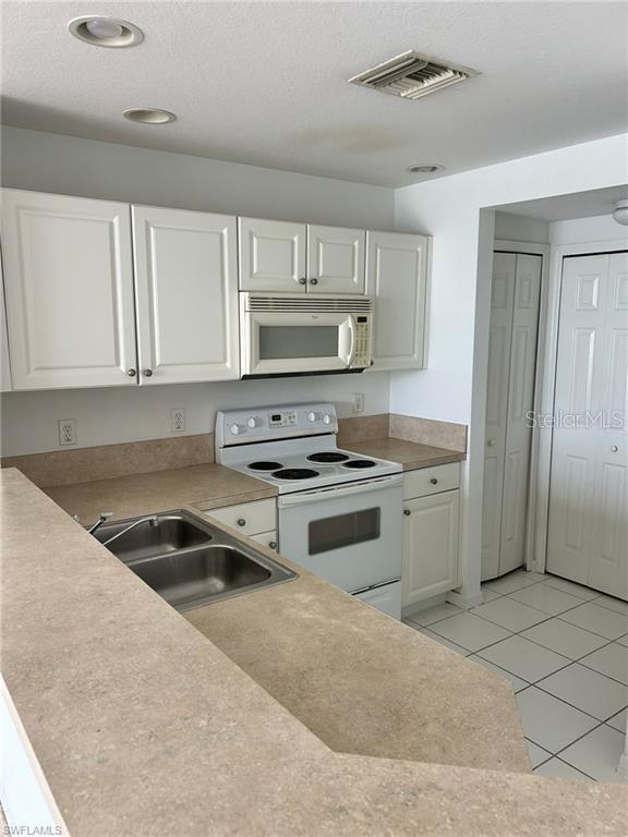 4256 LIRON AVENUE UNIT 103, FORT MYERS, FL — photo 4 of 25