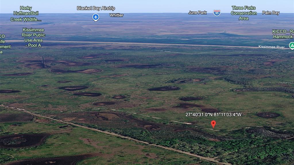 This is an aerial map view of a rural landscape with a red location pin — 0 UNKNOWN, FROSTPROOF, FL