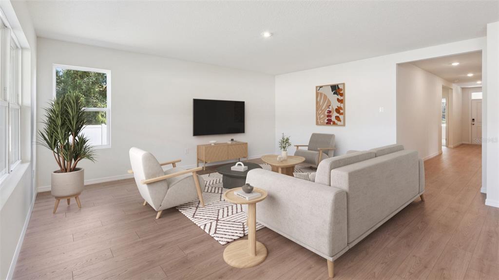 This is a digital rendering of a living room with light wood floors and neutral furniture — 24226 NW 13TH BOULEVARD, NEWBERRY, FL