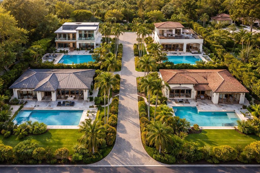 An aerial view of a house with a pool, a detached garage, and an RV port — 2424 ASHTON ROAD, SARASOTA, FL