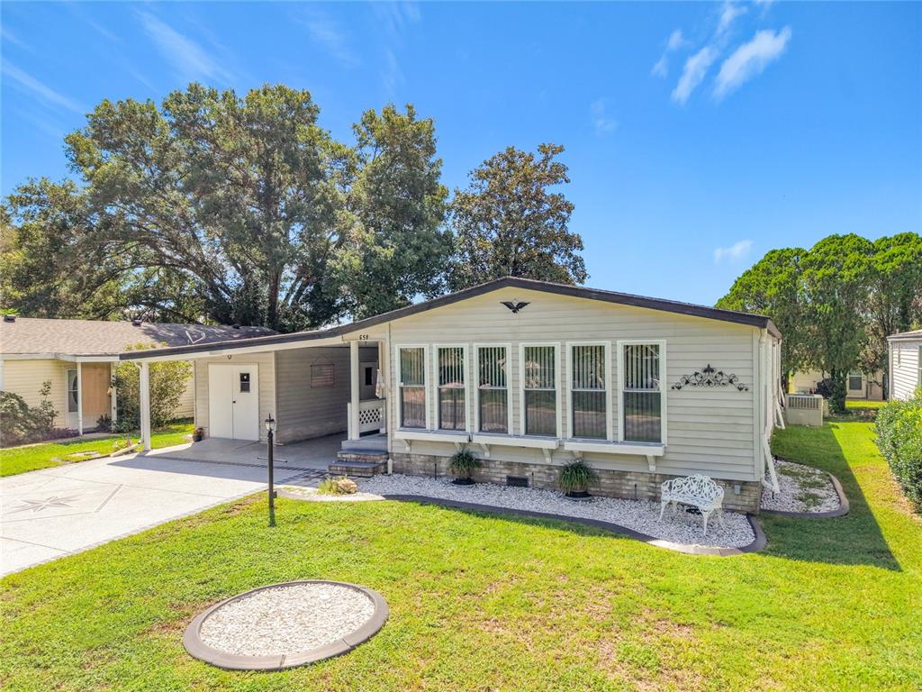 658 RAINBOW BOULEVARD, LADY LAKE, FL — photo 4 of 30