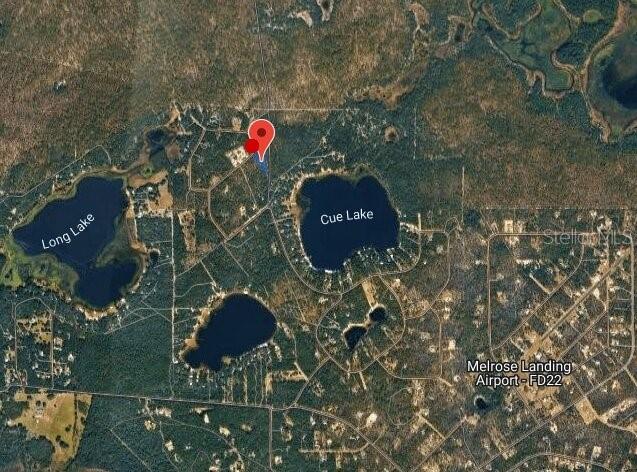 This is an aerial map showing residential lots near Long Lake and Cue Lake — 181 HILL TOP LOOP, HAWTHORNE, FL