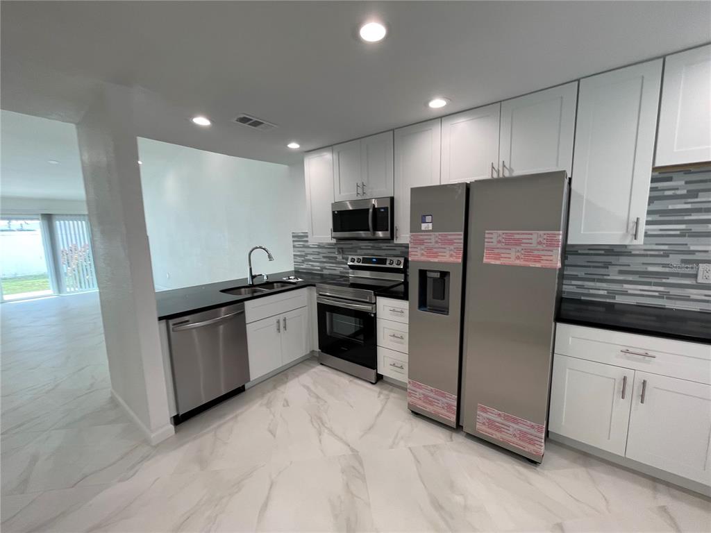1765 ORANGE BOULEVARD WAY, PALM HARBOR, FL — photo 4 of 21