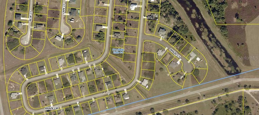 This is an aerial map showing residential lots and streets in a suburban neighborhood — 7062 BRAZIL CIRCLE, LABELLE, FL