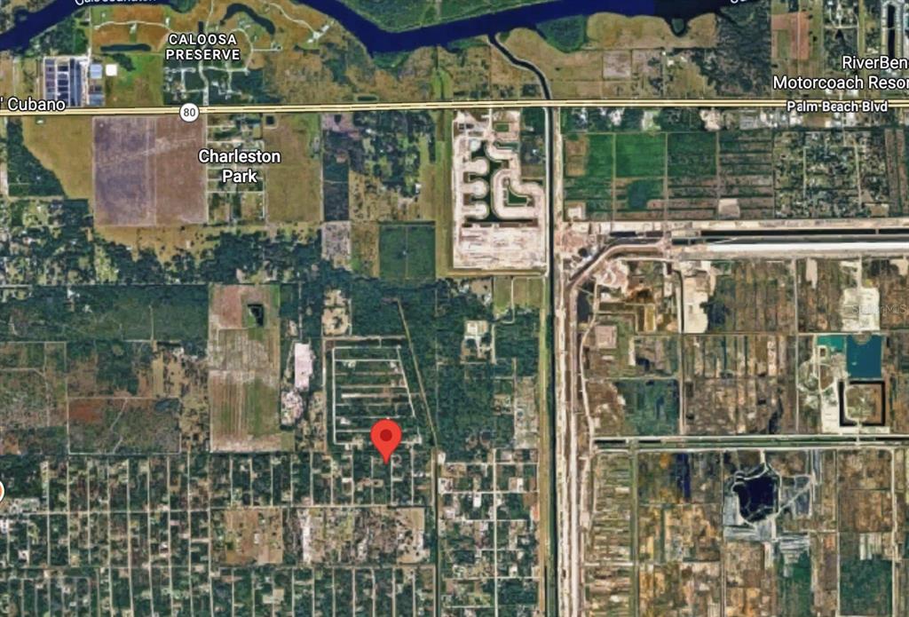 This is a satellite map view showing a residential area near Charleston Park in Florida — 2319 ABBOTT AVENUE, ALVA, FL