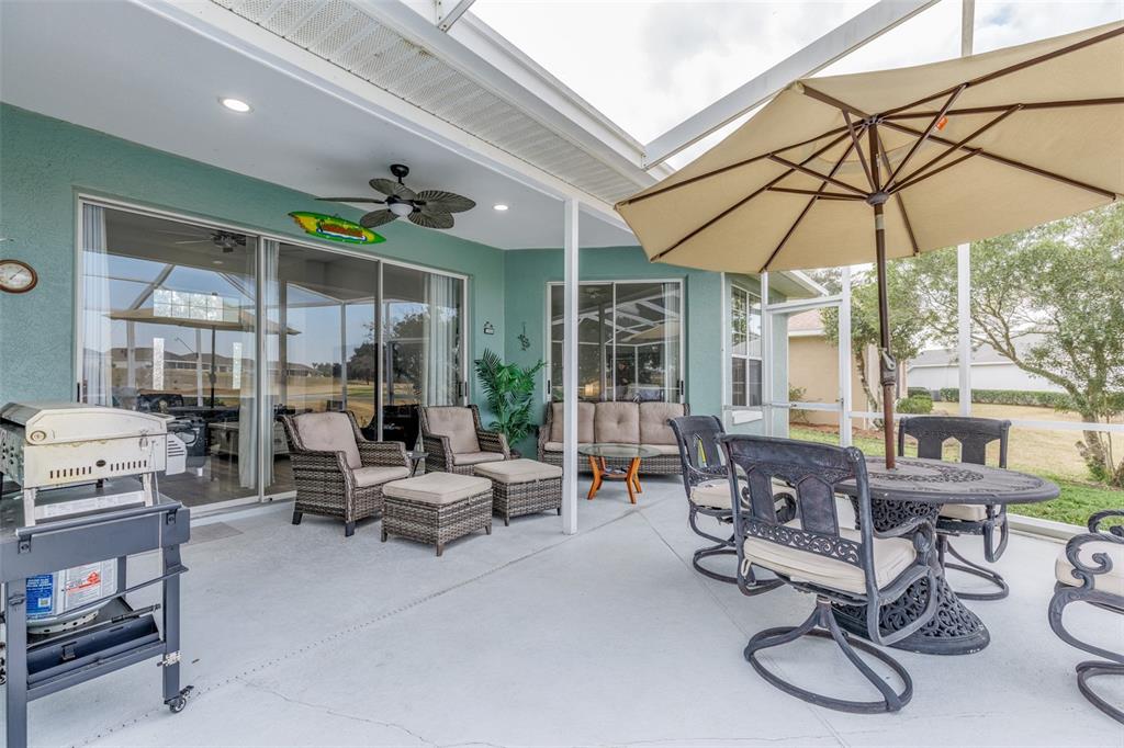 An aerial view of a single-story house with a light blue exterior and gray roof — 4740 N CRESTLINE DRIVE, BEVERLY HILLS, FL