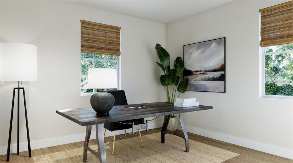 This rendering shows a home office with a wooden desk, black chair, and two windows — 23 ELLAVILLE DRIVE, ST AUGUSTINE, FL