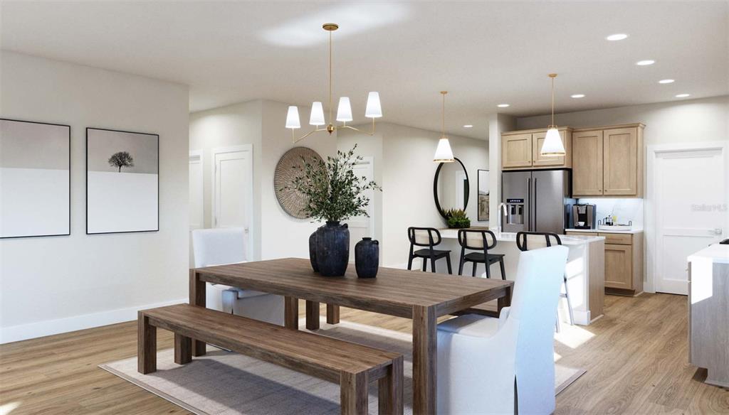 This is a digital rendering of a dining area and kitchen with light wood flooring — 23 ELLAVILLE DRIVE, ST AUGUSTINE, FL