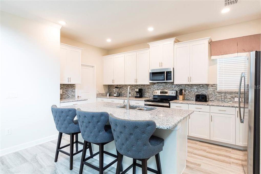 1577 SLICE WAY, CHAMPIONS GATE, FL — photo 5 of 30
