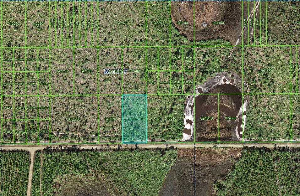 This is a satellite map showing a highlighted rectangular land parcel among surrounding lots — TBD, FROSTPROOF, FL