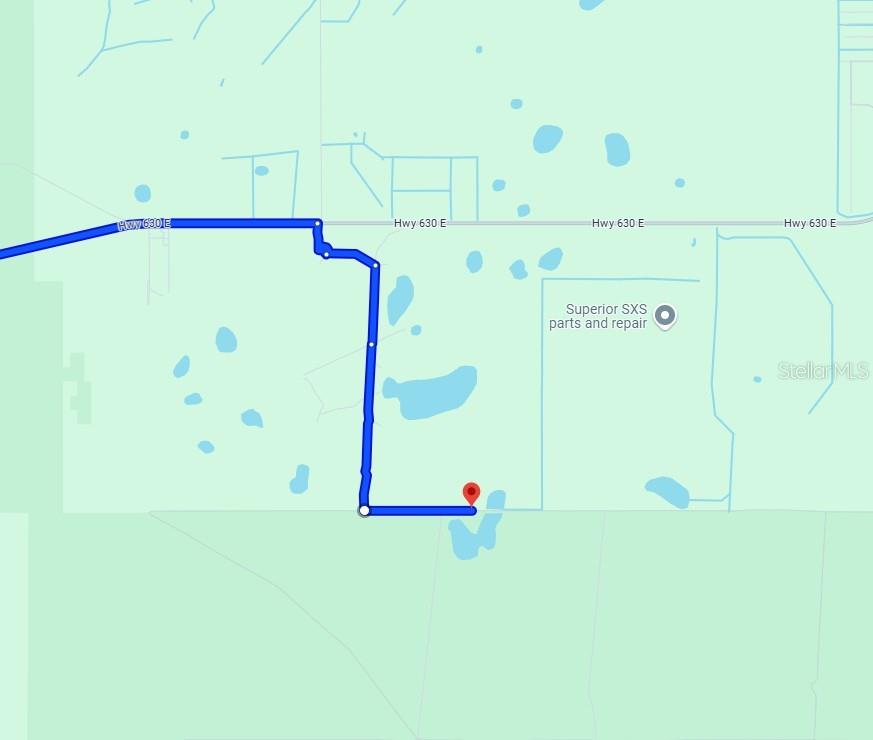 This map shows a property location with a blue route line leading to a destination — TBD, FROSTPROOF, FL
