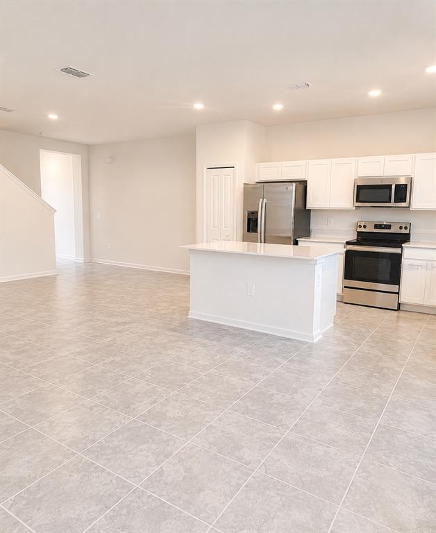 409 BOGEY DRIVE, DAVENPORT, FL — photo 4 of 25