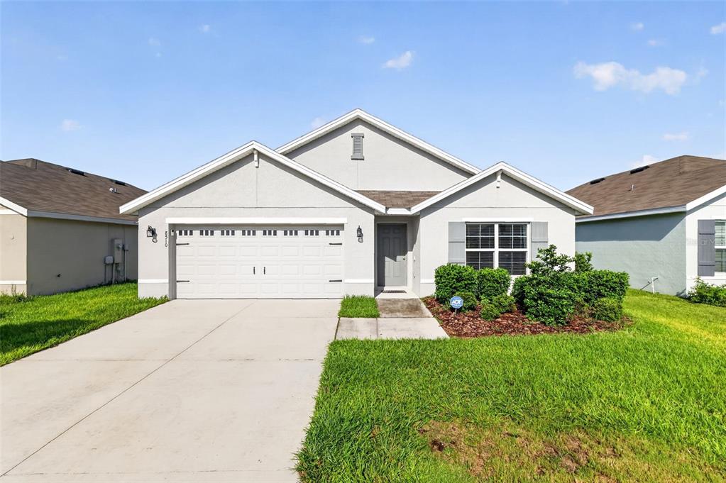 8510 TRIUMPH CIRCLE, WILDWOOD, FL — photo 2 of 30