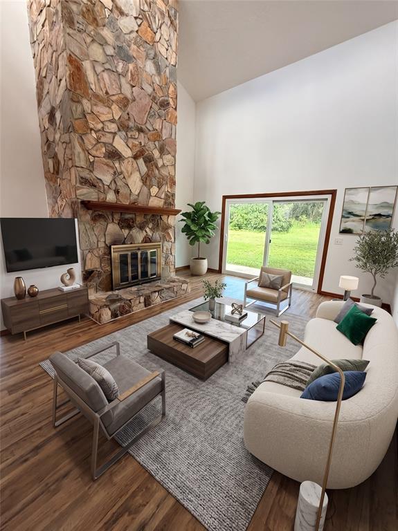 A kitchen island with white cabinets and granite countertops sits before a sliding glass door — 2598 ENTERPRISE OSTEEN ROAD, OSTEEN, FL