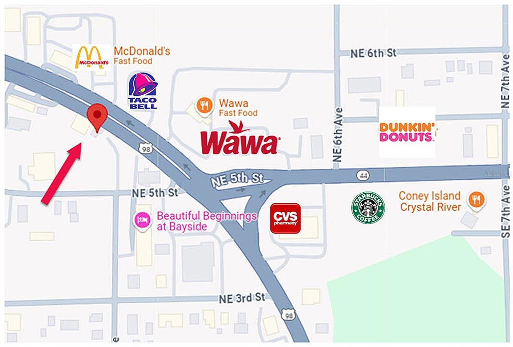 This map shows the location of various businesses and landmarks near a red pin marker — 602 NE US HIGHWAY 19, CRYSTAL RIVER, FL