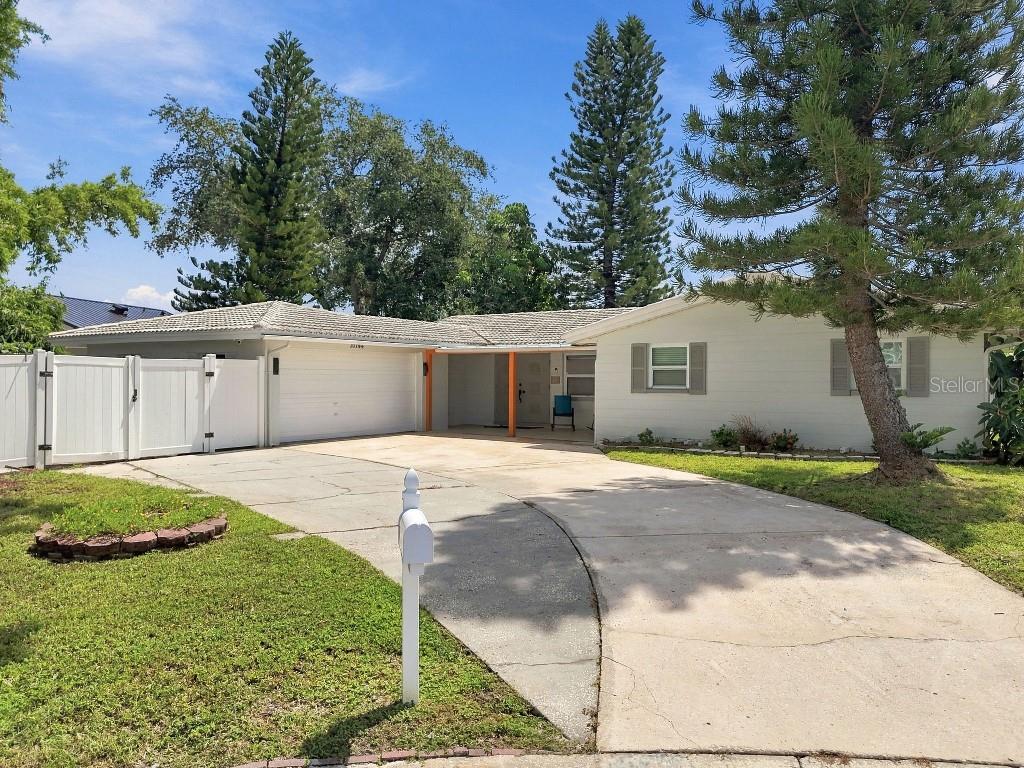 10744 DRUMMOND ROAD, TAMPA, FL — photo 2 of 30