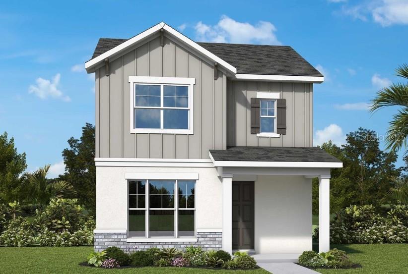 A two-story house under construction with a stucco exterior and blue weather-resistant house wrap — 2831 CRIMSON CAP STREET, ODESSA, FL