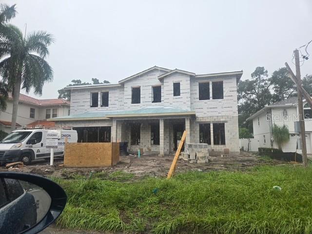 This image is a two-story floor plan showing the layout of a residential home — 4110 W SAN LUIS STREET, TAMPA, FL