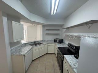 5536 METROWEST BOULEVARD UNIT 8-101, ORLANDO, FL — photo 3 of 13