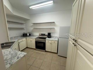 5536 METROWEST BOULEVARD UNIT 8-101, ORLANDO, FL — photo 4 of 13