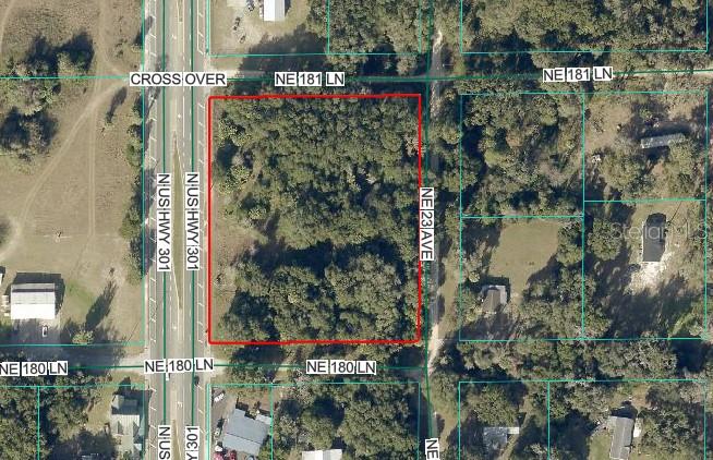 This is an aerial map showing a rectangular plot of land outlined in red — 18011 N US HWY 301, CITRA, FL