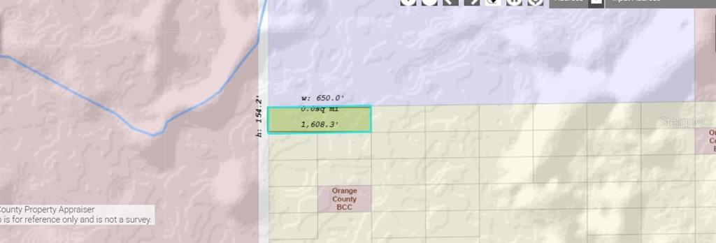 This is a map showing a highlighted rectangular land parcel with its dimensions labeled — 2473 DILL ROAD, ORLANDO, FL