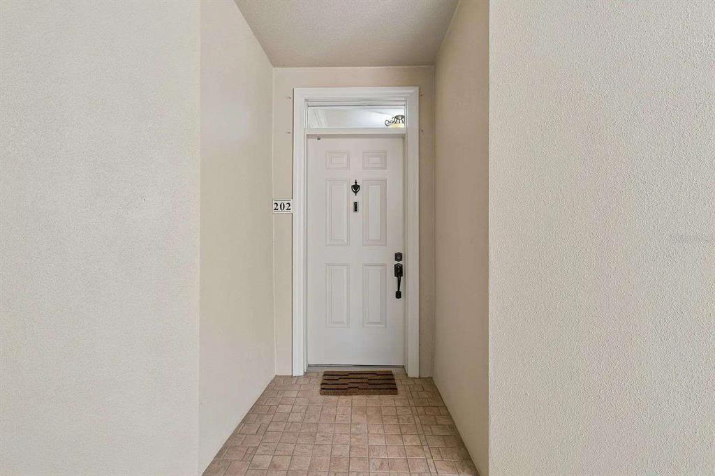 7702 LAKE VISTA COURT UNIT 202, BRADENTON, FL — photo 5 of 26